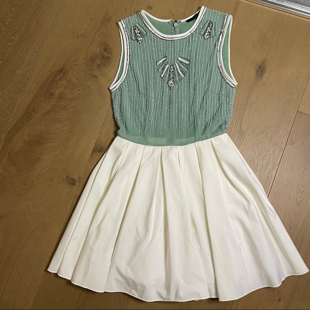 Green and white sequin dress